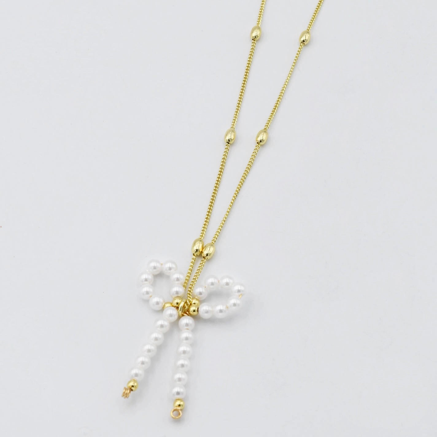 Pretty Pearl Bow Pendant Necklace